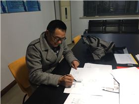 上海世博會世界氣象組織館設計大師吳曉飛為東吳鋼構(gòu)出謀劃策.jpg